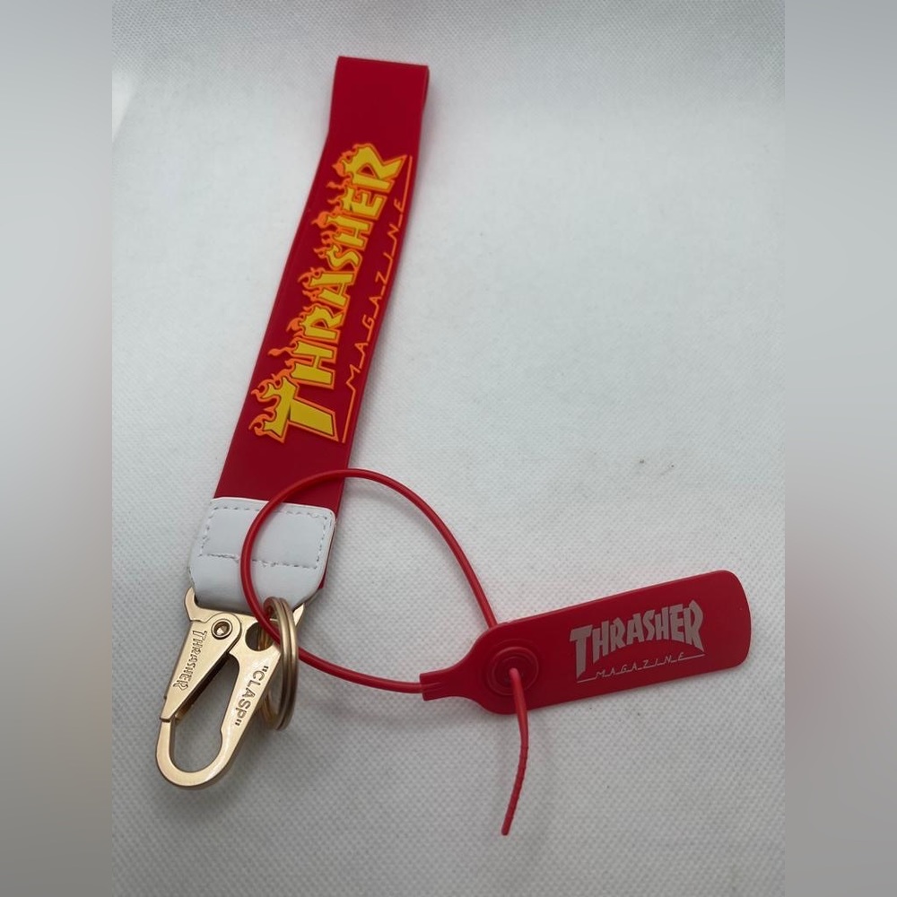 Thrasher Keychain. Red with yellow letters. NWT
